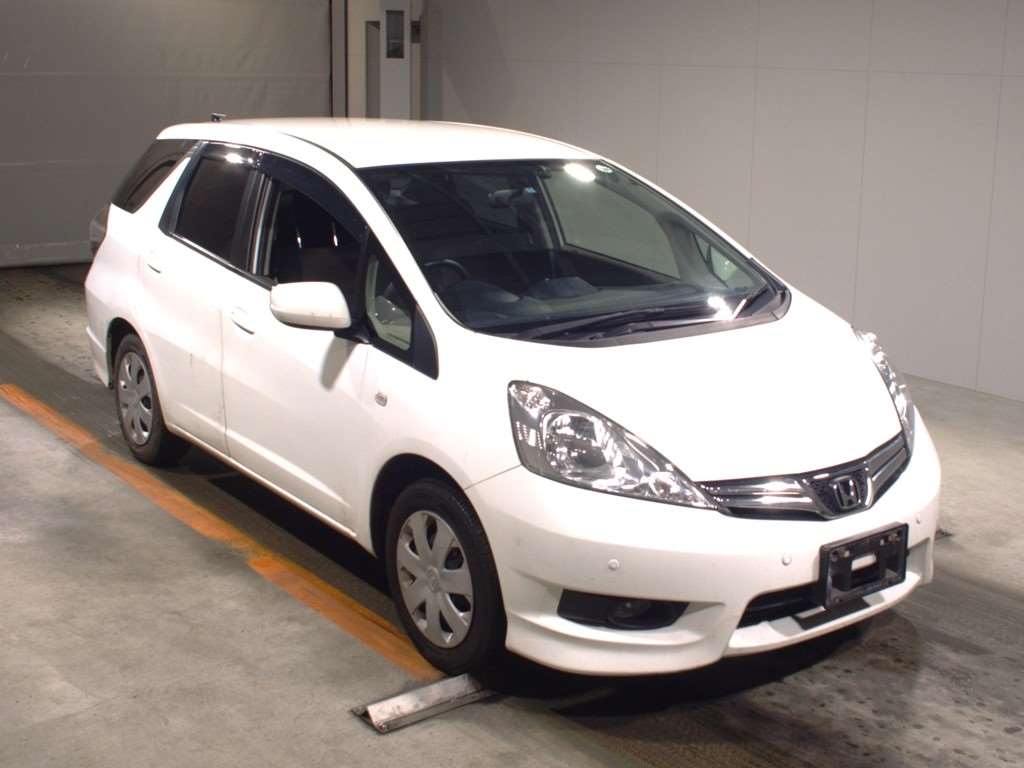 Fit shuttle hybrid. Honda Fit Shuttle. Honda Fit Shuttle 2012. Honda Fit Shuttle Hybrid 2022. Honda Fit Shuttle белый.